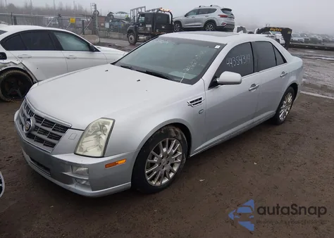2010 Cadillac Sts Luxury Package z USA, uszkodzony, nr VIN 1G6DU6EV2A0145932